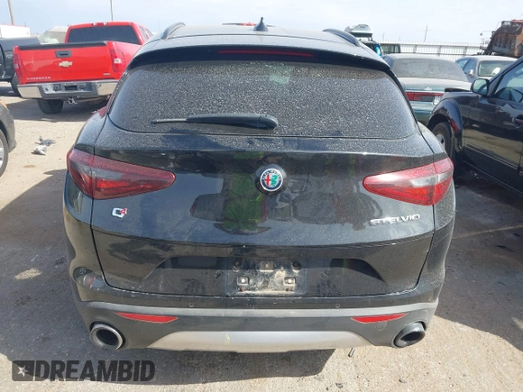 2018 Alfa Romeo Stelvio Sport z VIN ZASFAKPN0J7B71013, wystawiony jako IAAI lot #41938050 z przebiegiem Nie podano mil oraz . Historia ofert i sprzedaży dostępna na DreamBid. Obrazek 16.