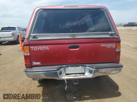 2000 Toyota Tacoma with VIN 4TAWN72N2YZ620655, listed as a Copart auction lot 60704065 with 257,636 mi miles and Salvage title. Bid and sale history available at DreamBid. Image 6.