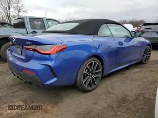 2023 BMW 4 Series 430i xDrive with VIN WBA43AT09PCM21604, listed as a Copart auction lot 49326175 with 15,305 mi miles and Salvage Title. Bid and sale history available at DreamBid. Image 3.