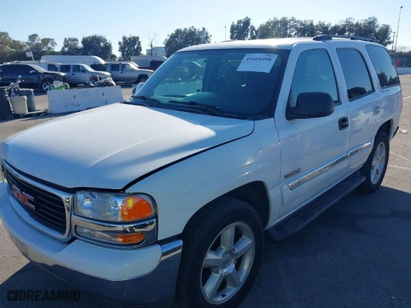 2004 GMC Yukon SLT with VIN 1GKEC13T64R289853, listed as a IAAI auction lot 41668408 with 163,829 mi miles. Bid and sale history available at carsss.com. Image 2.