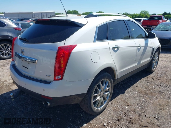 2013 Cadillac SRX Premium Collection with VIN 3GYFNEE33DS554556, listed as a IAAI auction lot 42152972 with 144,668 mi miles and . Bid and sale history available at DreamBid. Image 4.