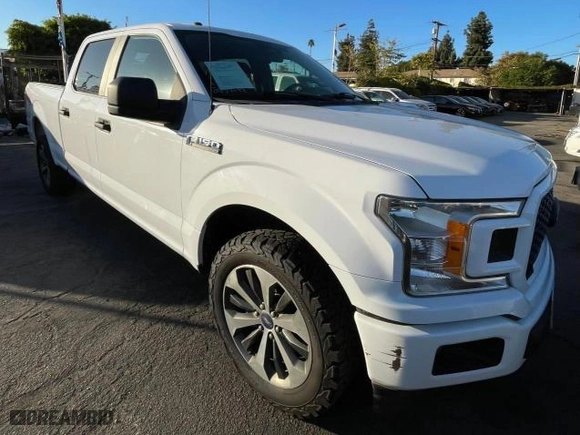2019 Ford F-150 XL with VIN 1FTFW1E45KKD51312, listed as a Copart auction lot 52055225 with 142,522 mi miles and Clean Title. Bid and sale history available at carsss.com. Image 1.