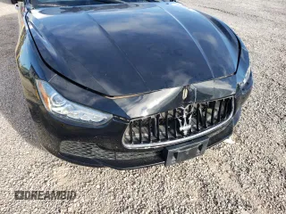 2016 Maserati Ghibli with VIN ZAM57XSA0G1179477, listed as a Copart auction lot 65464962 with 58,775 mi miles. Bid and sale history available at carsss.com. Image 9.