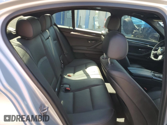 2014 BMW 5 Series 528i with VIN WBA5A5C54ED509285, listed as a Copart auction lot 52080765 with 104,802 mi miles and Salvage Title. Bid and sale history available at carsss.com. Image 10.