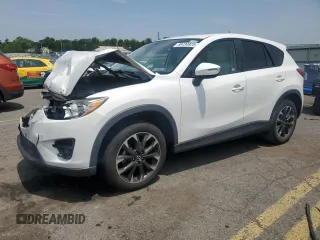2016 Mazda CX-5 Grand Touring z VIN JM3KE4DY1G0706655, wystawiony jako Copart lot #59734825 z przebiegiem 73 425 mil mil oraz Szkoda całkowita • Salvage title. Historia ofert i sprzedaży dostępna na DreamBid. Obrazek 1.