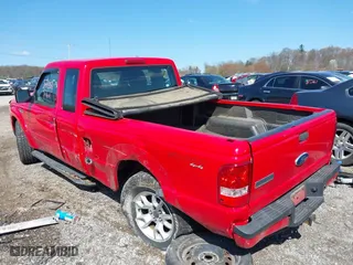 2011 Ford Ranger XLT with VIN 1FTLR4FE5BPA57057, listed as a IAAI auction lot 41995162 with 238,987 mi miles. Bid and sale history available at carsss.com. Image 6.