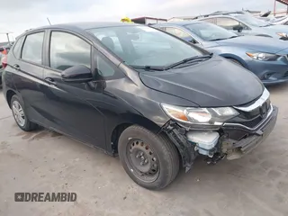 2020 Honda Fit LX z VIN 3HGGK5H40LM717305, wystawiony jako IAAI lot #42093169 z przebiegiem 69 665 mil mil oraz . Historia ofert i sprzedaży dostępna na DreamBid. Obrazek 1.