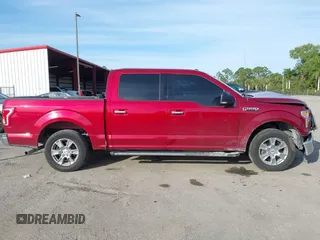 2015 Ford F-150 XLT with VIN 1FTEW1C87FKD70547, listed as a IAAI auction lot 41451841 with 151,596 mi miles and . Bid and sale history available at carsss.com. Image 14.