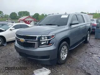 2019 Chevrolet Suburban LT with VIN 1GNSKHKCXKR405555, listed as a IAAI auction lot 42188860 with 143,435 mi miles and . Bid and sale history available at DreamBid. Image 17.