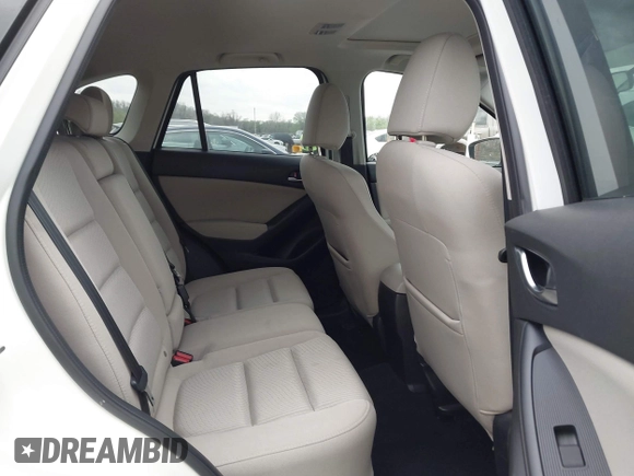 2015 Mazda CX-5 Touring with VIN JM3KE2CY3F0550624, listed as a IAAI auction lot 41931268 with 51,588 mi miles and . Bid and sale history available at carsss.com. Image 8.