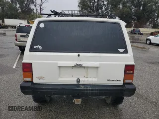 1989 Jeep Cherokee z VIN 1J4FT28LXKL601505, wystawiony jako Copart lot #49312265 z przebiegiem 264 769 mil mil oraz Szkoda całkowita • Salvage title. Historia ofert i sprzedaży dostępna na DreamBid. Obrazek 6.