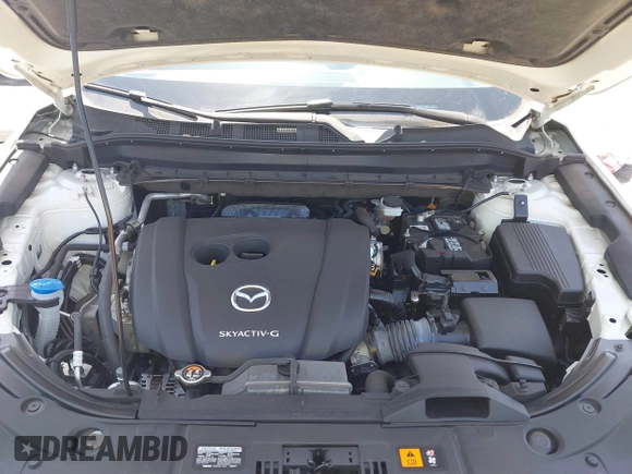 2020 Mazda CX-5 Grand Touring with VIN JM3KFADM9L0821930, listed as a IAAI auction lot 42549986 with 29,929 mi miles and . Bid and sale history available at DreamBid. Image 10.