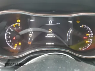 2014 Jeep Grand Cherokee Limited with VIN 1C4RJEBT5EC147459, listed as a Copart auction lot 87828735 with 213,960 mi miles and Clean Title. Bid and sale history available at DreamBid. Image 9.