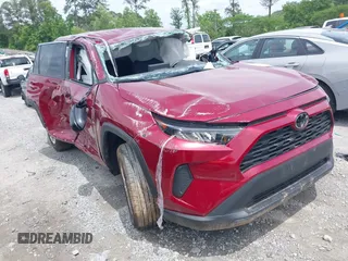 2022 Toyota RAV4 LE with VIN 2T3H1RFV3NW207623, listed as a IAAI auction lot 42165957 with 33,804 mi miles and . Bid and sale history available at DreamBid. Image 1.