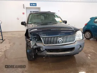 2003 Mercury Mountaineer Convenience z VIN 4M2ZU86W03UJ16828, wystawiony jako IAAI lot #41580919 z przebiegiem 148 968 mil mil oraz . Historia ofert i sprzedaży dostępna na DreamBid. Obrazek 12.