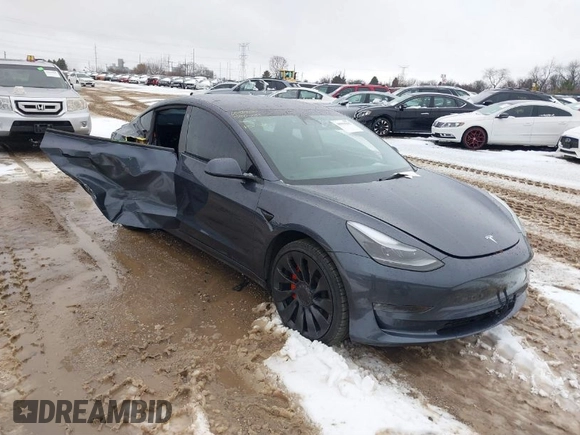 2023 Tesla Model 3 Performance with VIN 5YJ3E1EC6PF590739, listed as a IAAI auction lot 40919165 with 20,474 mi miles. Bid and sale history available at carsss.com. Image 1.