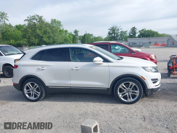 2015 Lincoln MKC z VIN 5LMCJ2A92FUJ06169, wystawiony jako IAAI lot #42326544 z przebiegiem 101 669 mil mil oraz . Historia ofert i sprzedaży dostępna na DreamBid. Obrazek 13.