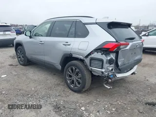 2024 Toyota RAV4 Hybrid XLE Premium with VIN JTMB6RFV0RD140022, listed as a IAAI auction lot 41779613 with 923 mi miles. Bid and sale history available at carsss.com. Image 3.