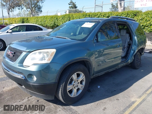 2009 GMC Acadia SLT1 with VIN 1GKER23D79J139611, listed as a IAAI auction lot 41969438 with 133,596 mi miles. Bid and sale history available at carsss.com. Image 2.