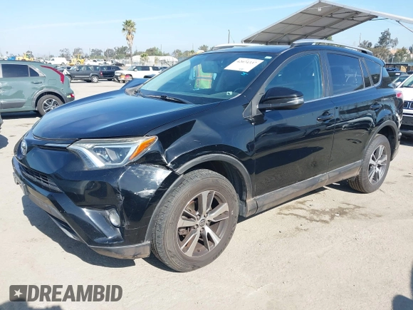 2016 Toyota RAV4 XLE with VIN 2T3RFREV6GW459313, listed as a IAAI auction lot 42074337 with 149,914 mi miles and . Bid and sale history available at DreamBid. Image 17.
