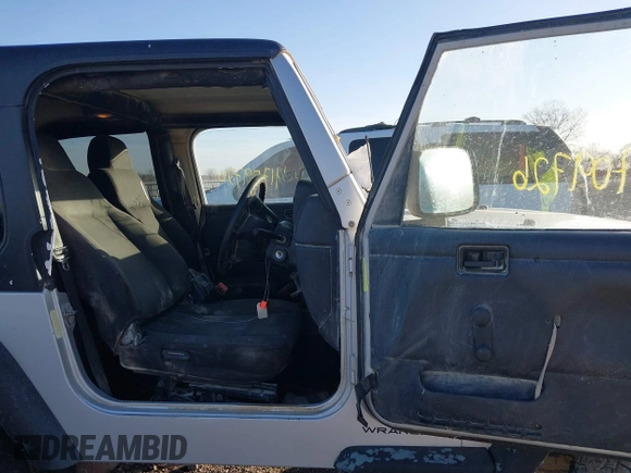 2006 Jeep Wrangler Sport Right Hand Drive with VIN 1J4F449SX6P764491, listed as a IAAI auction lot 41709726 with 290,798 mi miles. Bid and sale history available at carsss.com. Image 5.