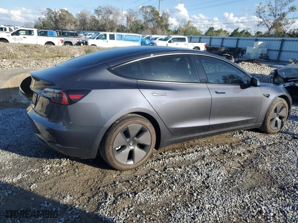 2023 Tesla Model 3 with VIN 5YJ3E1EAXPF704742, listed as a Copart auction lot 86323624 with 4,401 mi miles and Salvage Title. Bid and sale history available at carsss.com. Image 3.