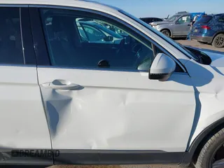 2018 Volkswagen Tiguan SEL Premium with VIN 3VV5B7AX2JM202908, listed as a IAAI auction lot 41137619 with 84,323 mi miles and . Bid and sale history available at DreamBid. Image 17.