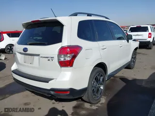 2014 Subaru Forester 2.0XT Premium with VIN JF2SJGDC6EH523777, listed as a IAAI auction lot 41699383 with 81,653 mi miles. Bid and sale history available at carsss.com. Image 4.