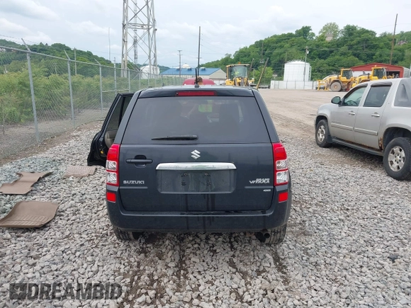 2012 Suzuki Grand Vitara Premium z VIN JS3TD0D6XC4100539, wystawiony jako IAAI lot #42384659 z przebiegiem 143 711 mil mil oraz . Historia ofert i sprzedaży dostępna na DreamBid. Obrazek 16.