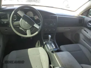 2006 Dodge Charger z VIN 2B3KA43G06H502230, wystawiony jako Copart lot #57057535 z przebiegiem 135 230 mil mil oraz Szkoda całkowita • Salvage title. Historia ofert i sprzedaży dostępna na DreamBid. Obrazek 8.