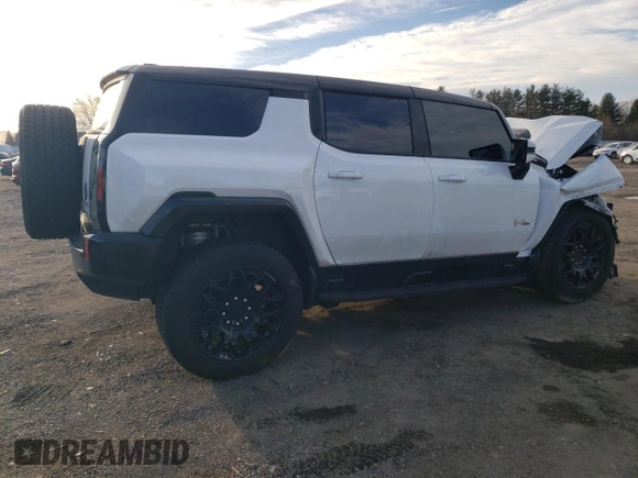 2025 GMC Hummer EV 2X with VIN 1GKB0NDE5SU102096, listed as a Copart auction lot 47083615 with 8,713 mi miles and Salvage Title. Bid and sale history available at carsss.com. Image 3.