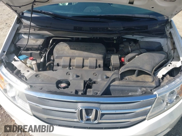 2013 Honda Odyssey Touring with VIN 5FNRL5H96DB009694, listed as a IAAI auction lot 42002487 with 182,867 mi miles and . Bid and sale history available at carsss.com. Image 10.