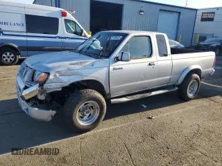 2000 Nissan Frontier XE with VIN 1N6ED26T1YC327635, listed as a Copart auction lot 43149525 with 922,578 mi miles and Salvage title. Bid and sale history available at DreamBid. Image 1.