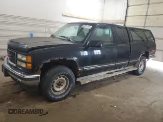 1995 GMC Sierra 1500 z VIN 1GTEK19K3SE548039, wystawiony jako Copart lot #58201755 z przebiegiem 124 841 mil mil oraz Czysty tytuł • Clean title. Historia ofert i sprzedaży dostępna na DreamBid. Obrazek 1.