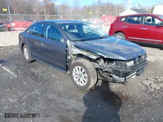 2015 Volkswagen Passat 1.8T Limited Edition with VIN 1VWAT7A37FC002698, listed as a IAAI auction lot 41736982 with 116,540 mi miles. Bid and sale history available at carsss.com. Image 1.