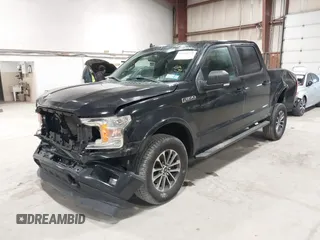 2020 Ford F-150 XL with VIN 1FTEW1EP7LFA52999, listed as a IAAI auction lot 42395772 with 75,709 mi miles and . Bid and sale history available at DreamBid. Image 2.