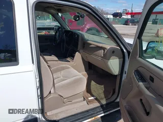 2005 Chevrolet Tahoe LS with VIN 1GNEK13T65J198121, listed as a IAAI auction lot 41826459 with 233,718 mi miles and . Bid and sale history available at DreamBid. Image 5.