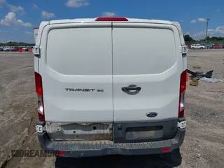 2018 Ford Transit with VIN 1FTYE1YM4JKA83438, listed as a IAAI auction lot 39881520 with 164,789 mi miles and . Bid and sale history available at carsss.com. Image 16.