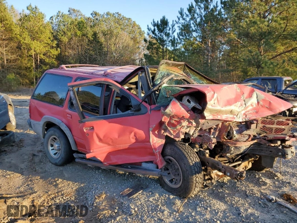 1999 Ford Explorer XL z VIN 1FMZU34X4XZC08095, wystawiony jako Copart lot #41383375 z przebiegiem 327 713 mil mil oraz Szkoda całkowita • Salvage title. Historia ofert i sprzedaży dostępna na DreamBid. Obrazek 4.