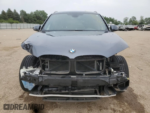 2017 BMW X1 xDrive28i with VIN WBXHT3Z3XH4A53999, listed as a Copart auction lot 60500265 with 43,377 mi miles and Salvage title. Bid and sale history available at DreamBid. Image 5.
