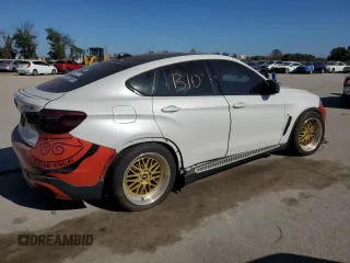 2017 BMW X6 M with VIN 5YMKW8C33H0U71879, listed as a Copart auction lot 86025064 with 52,064 mi miles and Clean Title. Bid and sale history available at carsss.com. Image 3.