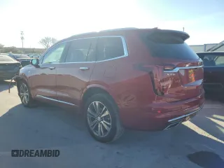 2021 Cadillac XT6 Premium Luxury with VIN 1GYKPDRS8MZ137909, listed as a Copart auction lot 41027774 with 55,353 mi miles and Salvage Title. Bid and sale history available at carsss.com. Image 2.