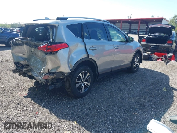 2018 Toyota RAV4 XLE with VIN JTMWFREV9JJ203353, listed as a IAAI auction lot 42129995 with 41,806 mi miles and . Bid and sale history available at DreamBid. Image 4.