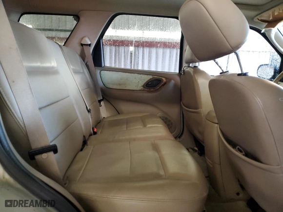 2005 Ford Escape Limited with VIN 1FMCU94115KD64704, listed as a Copart auction lot 48474865 with 123,739 mi miles and Salvage Title. Bid and sale history available at carsss.com. Image 11.