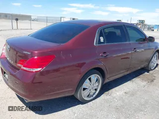 2006 Toyota Avalon XL with VIN 4T1BK36B36U087385, listed as a IAAI auction lot 41986866 with 128,594 mi miles. Bid and sale history available at carsss.com. Image 4.