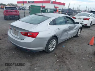 2018 Chevrolet Malibu LT z VIN 1G1ZD5STXJF115938, wystawiony jako IAAI lot #40865907 z przebiegiem 123 115 mil mil oraz . Historia ofert i sprzedaży dostępna na DreamBid. Obrazek 4.