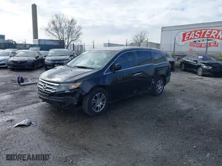 2011 Honda Odyssey EX-L with VIN 5FNRL5H62BB069118, listed as a IAAI auction lot 41808017 with 138,271 mi miles. Bid and sale history available at carsss.com. Image 2.