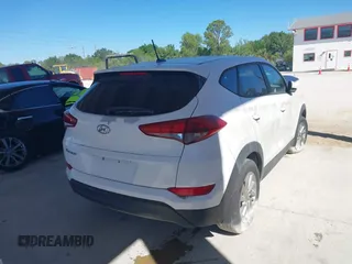 2017 Hyundai Tucson SE with VIN KM8J23A45HU328404, listed as a IAAI auction lot 41695180 with 120,458 mi miles. Bid and sale history available at carsss.com. Image 4.