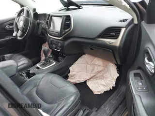 2015 Jeep Cherokee Limited with VIN 1C4PJMDS5FW587879, listed as a IAAI auction lot 41864622 with 143,843 mi miles. Bid and sale history available at carsss.com. Image 5.
