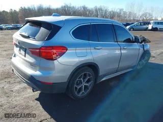 2018 BMW X1 xDrive28i with VIN WBXHT3C36J5L33781, listed as a IAAI auction lot 41497360 with 61,251 mi miles. Bid and sale history available at carsss.com. Image 4.